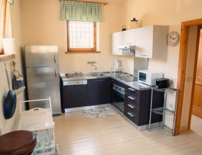 Cucina e fornelli con utensili - Loft Verdemare